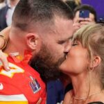 FILE - Kansas City Chiefs tight end Travis Kelce (87) and Taylor Swift kiss after the Chiefs defeated the San Francisco 49ers in the NFL Super Bowl 58 football game on Feb. 11, 2024, in Las Vegas. (AP Photo/John Locher, File)